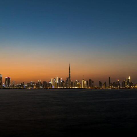 Stunning view of Dubai's skyline at twilight featuring the iconic Burj Khalifa.