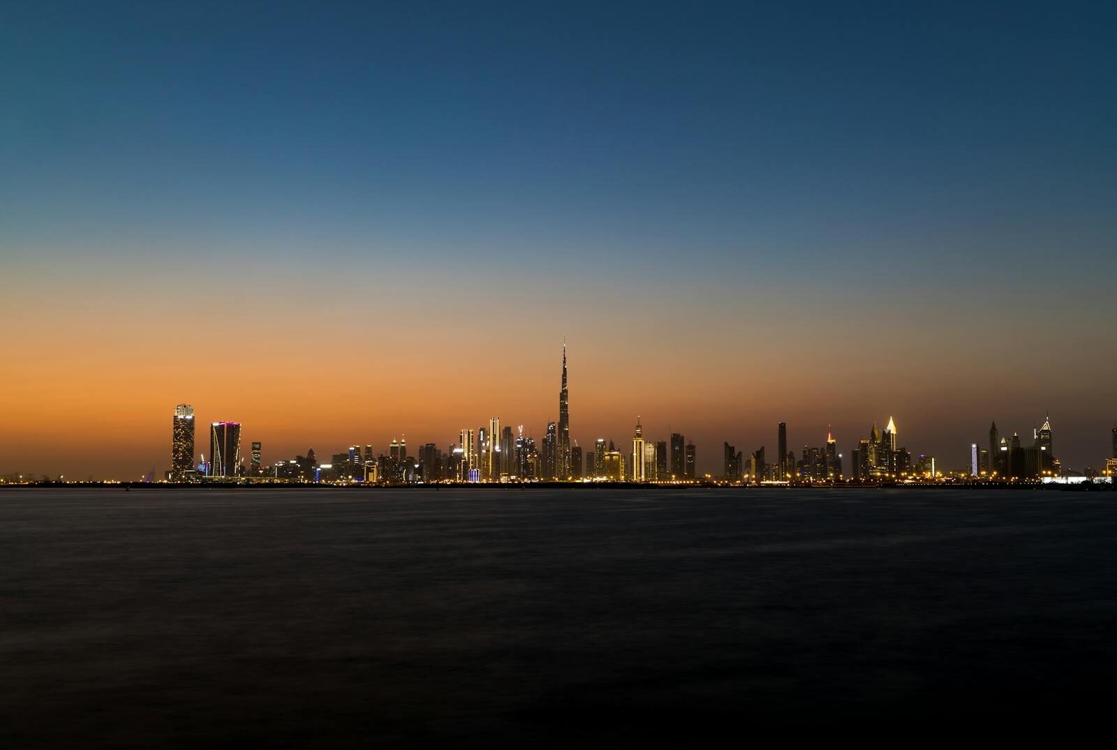 Stunning view of Dubai's skyline at twilight featuring the iconic Burj Khalifa.