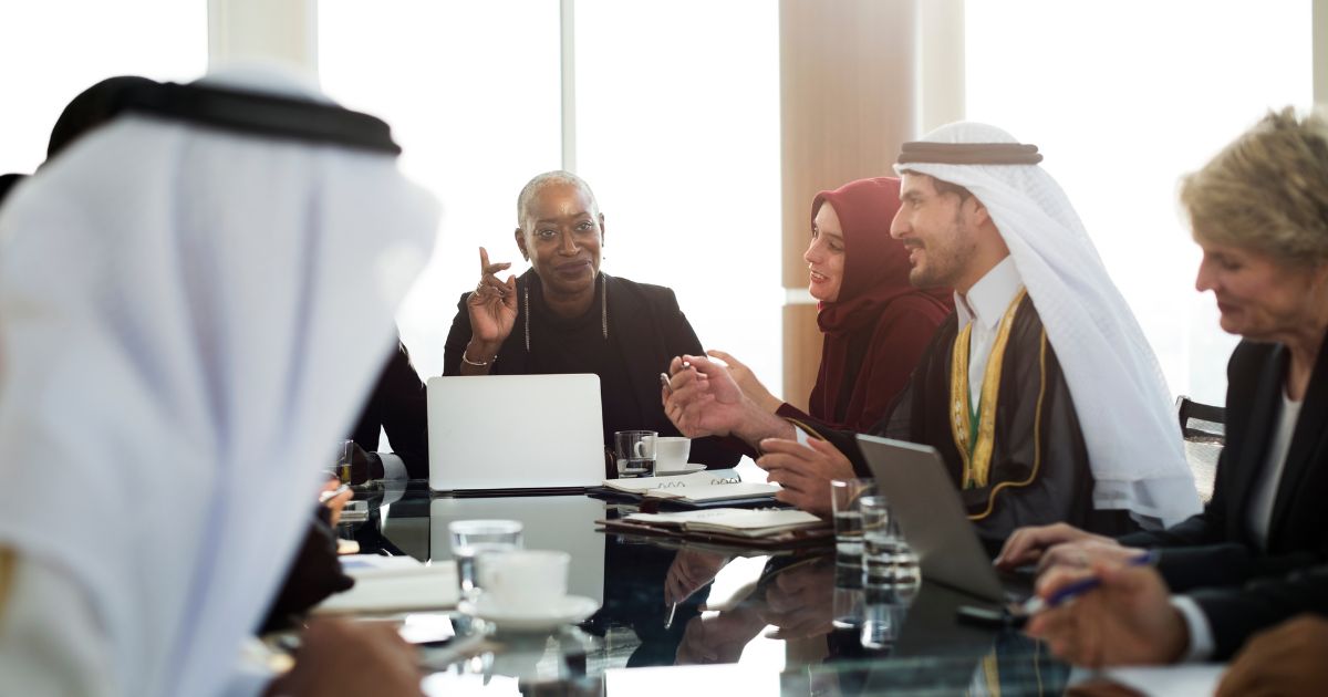Business leaders discussing Non-Profit Companies during a corporate board meeting in the UAE.