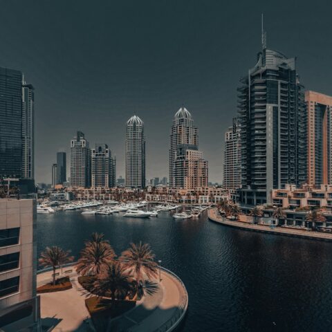 A picture of a city with a river running through it