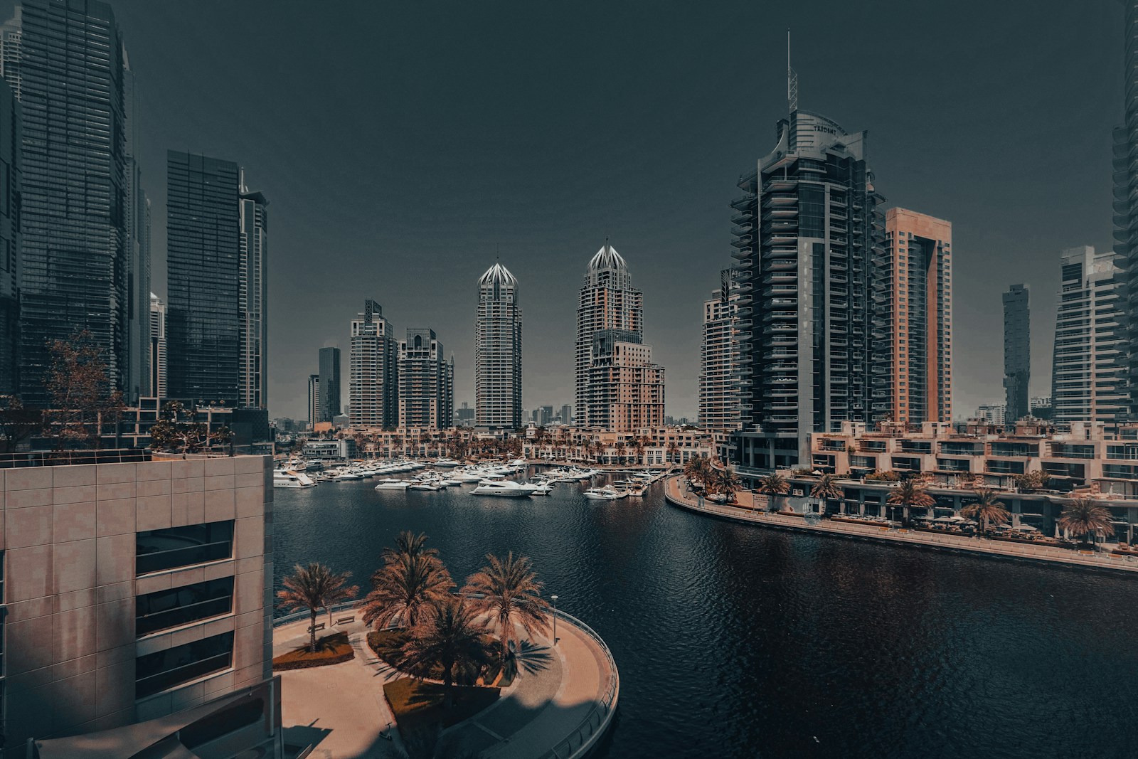 A picture of a city with a river running through it