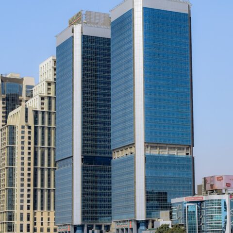 white and blue concrete building during daytime